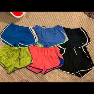 Lot of 6 pair Nike shorts and 1 Adidas tank top